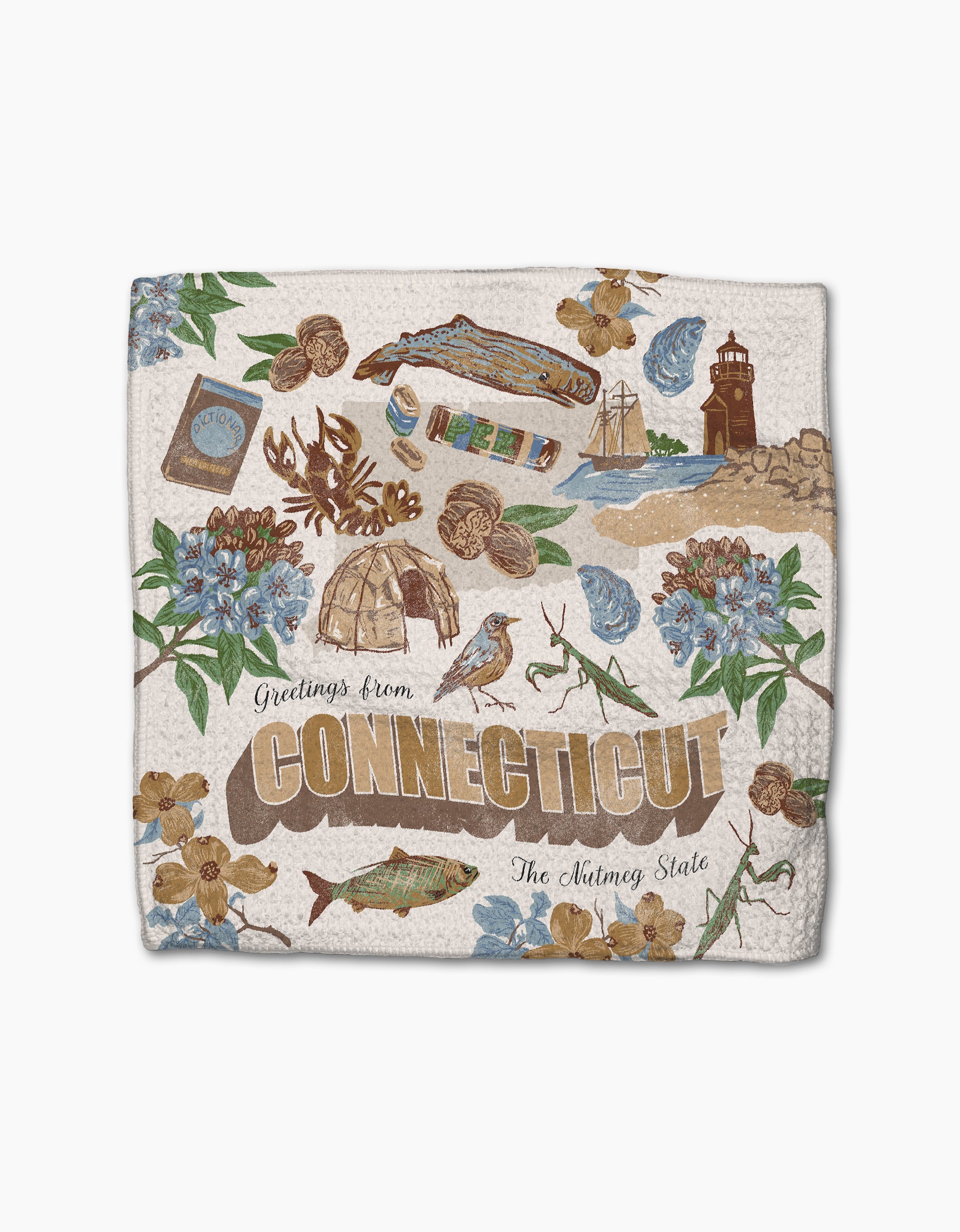 The Geometry “Greetings From Connecticut” blanket showcases state icons like nutmeg, a turtle, and a lighthouse on white—crafted from recycled materials for an eco-friendly touch.
