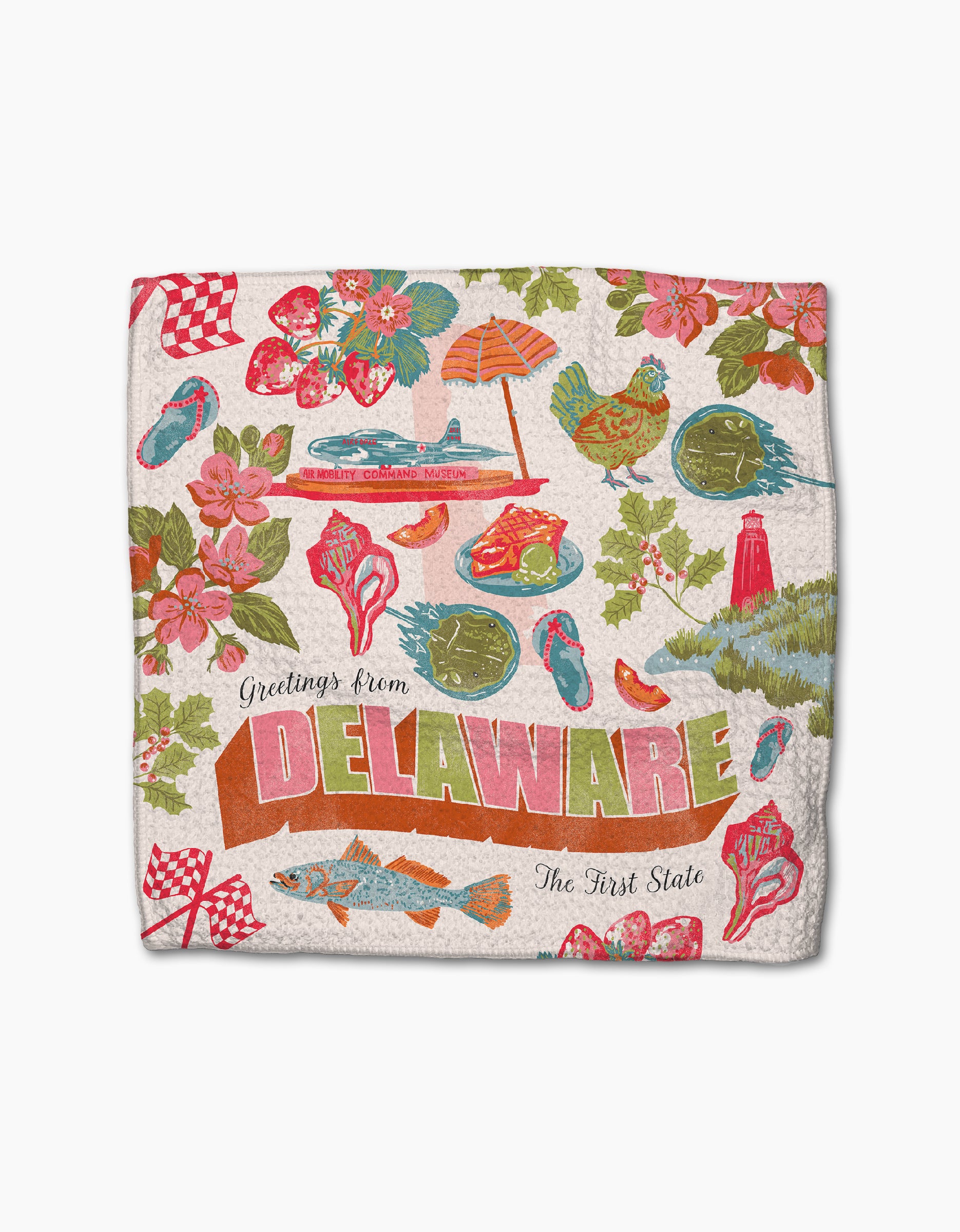 The Geometry "Greetings From Delaware" towel is made from recycled materials and features colorful illustrations of Delaware icons—flowers, a horseshoe crab, fish, a lighthouse, flip-flops, food—and the text "Greetings from Delaware, The First State.