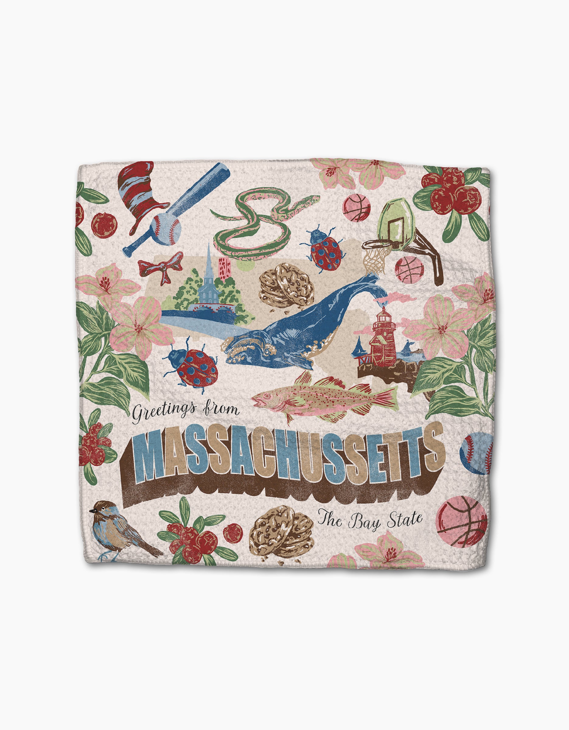 Geometry’s “Greetings From Massachusetts” decorative towel is made from recycled materials and features state icons—whale, flowers, lighthouse, bird, basketball, lobster, cranberries, and a red sock—on a beige background.