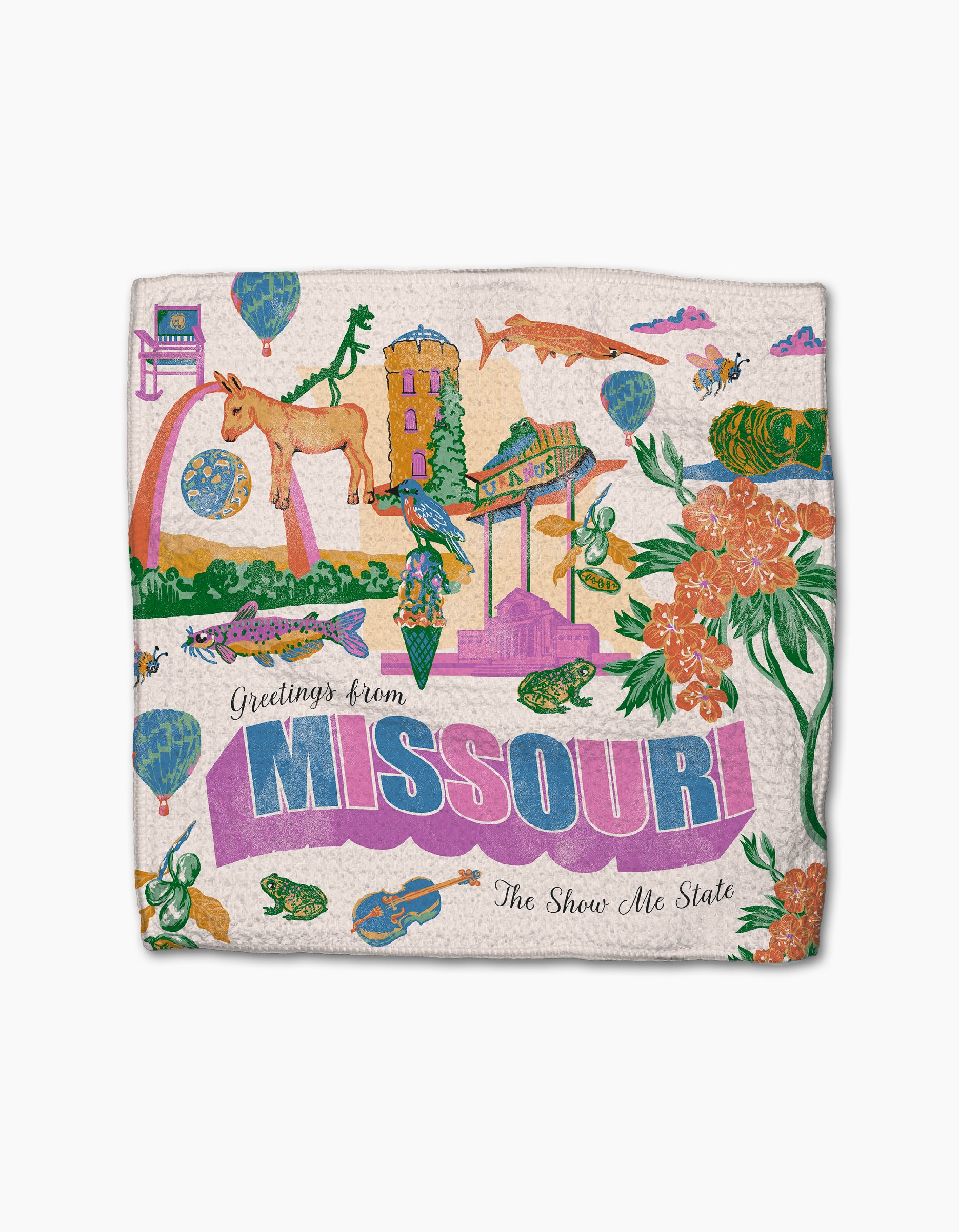 The Geometry "Greetings From Missouri" dishtowel set features a vibrant design of state landmarks, animals, flowers, and instruments with "Greetings from MISSOURI" and "The Show Me State" in bold across the center.