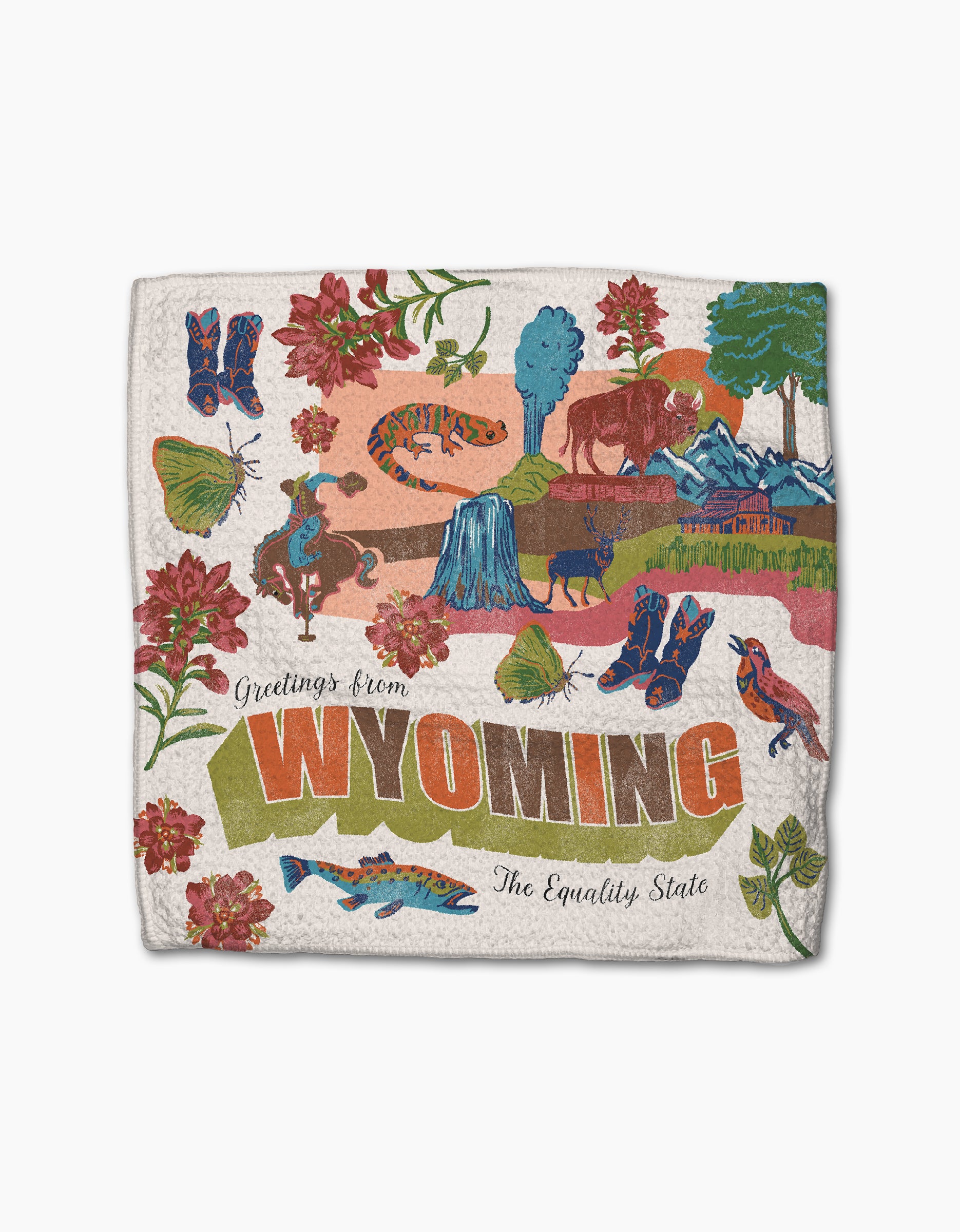 Geometry’s "Greetings From Wyoming" dishcloth set features a vibrant illustration with iconic state symbols—like a bison, cowboy, and trout—and “The Equality State,” all on recycled textured fabric.