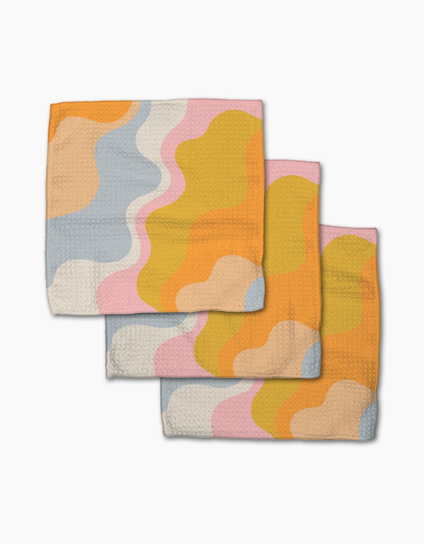 Three folded, super-absorbent Gerdadzy Happy Waves dishtowels featuring a wavy abstract pattern in orange, yellow, pink, light blue, and beige are stacked with slight overlap on a white background.