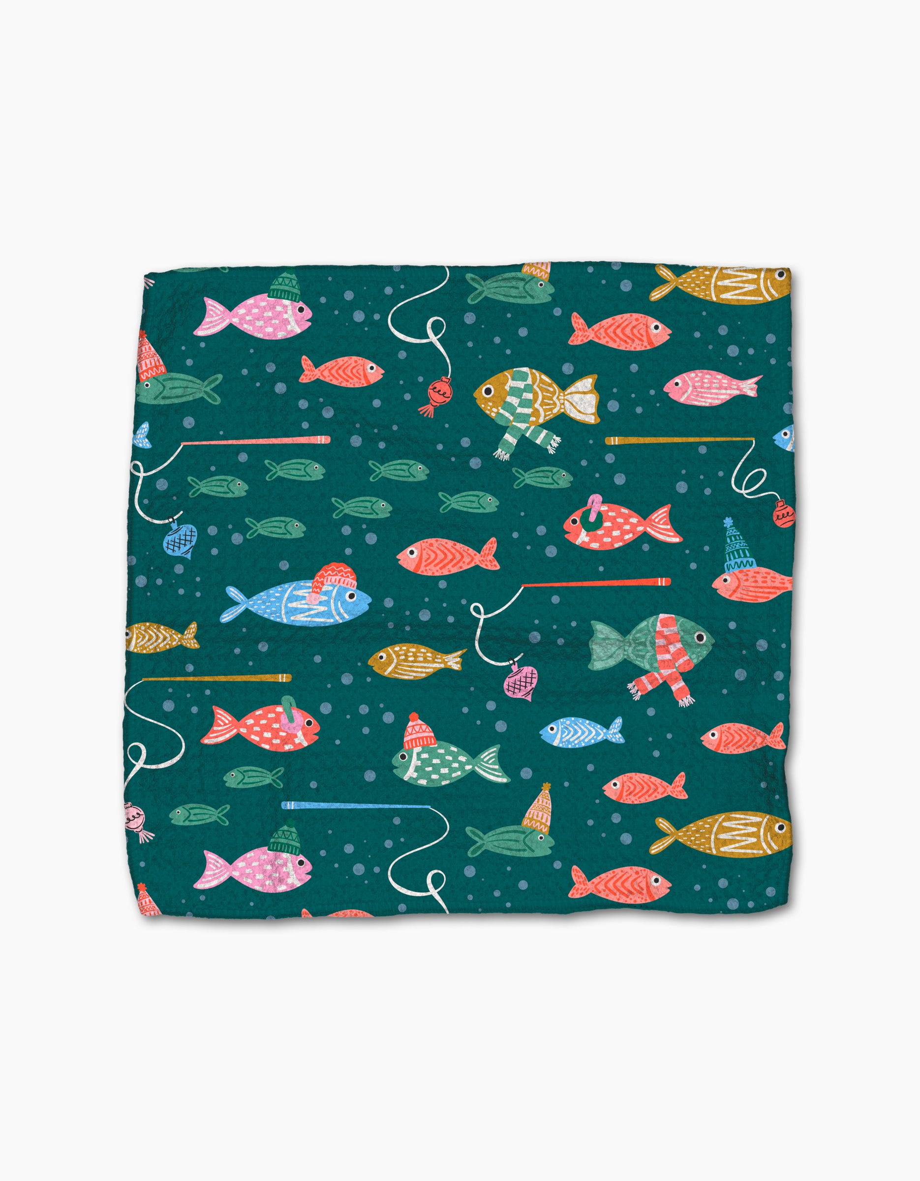 The "Holiday Fish" dishcloth by Charlie Rowan Designs features a square shape with vibrant fish and fishing lines on dark teal. Made from recycled materials, it showcases pink, orange, blue, green, and yellow fish.