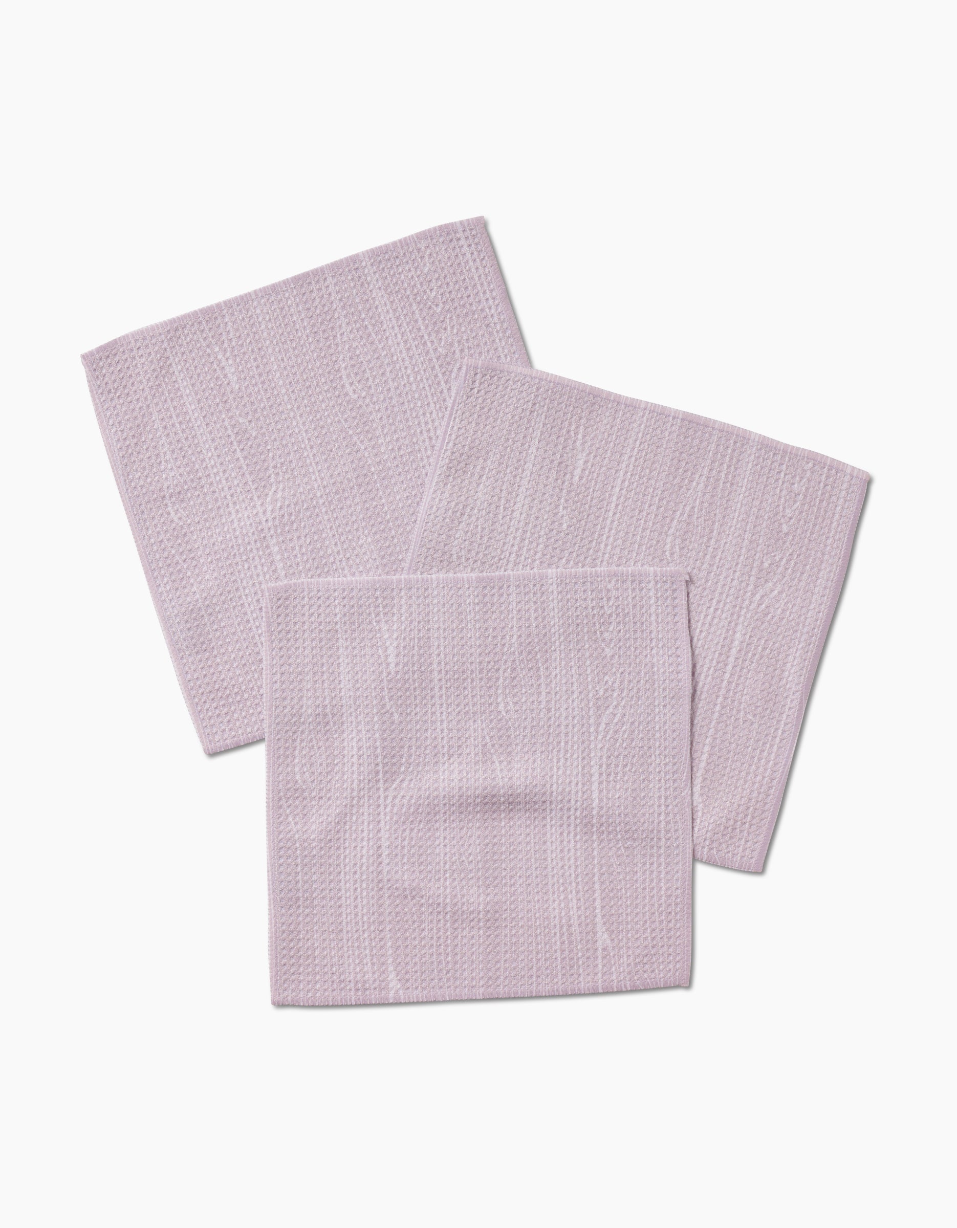 Three Houston Wood dishcloths by Kailee Wright are laid out on a white background, slightly overlapping each other.