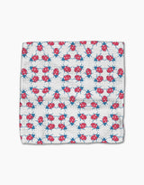 The Ladybug Dance dishcloth by Second Nature Studio features a white Geoweave fabric with rows of playful red and blue ladybugs, crafted from recycled materials for an eco-friendly touch.