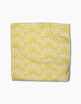The Ashley Celena Lemon Pop is a yellow, super-absorbent dishcloth with white sunburst or daisy patterns, neatly folded and displayed on a white background.