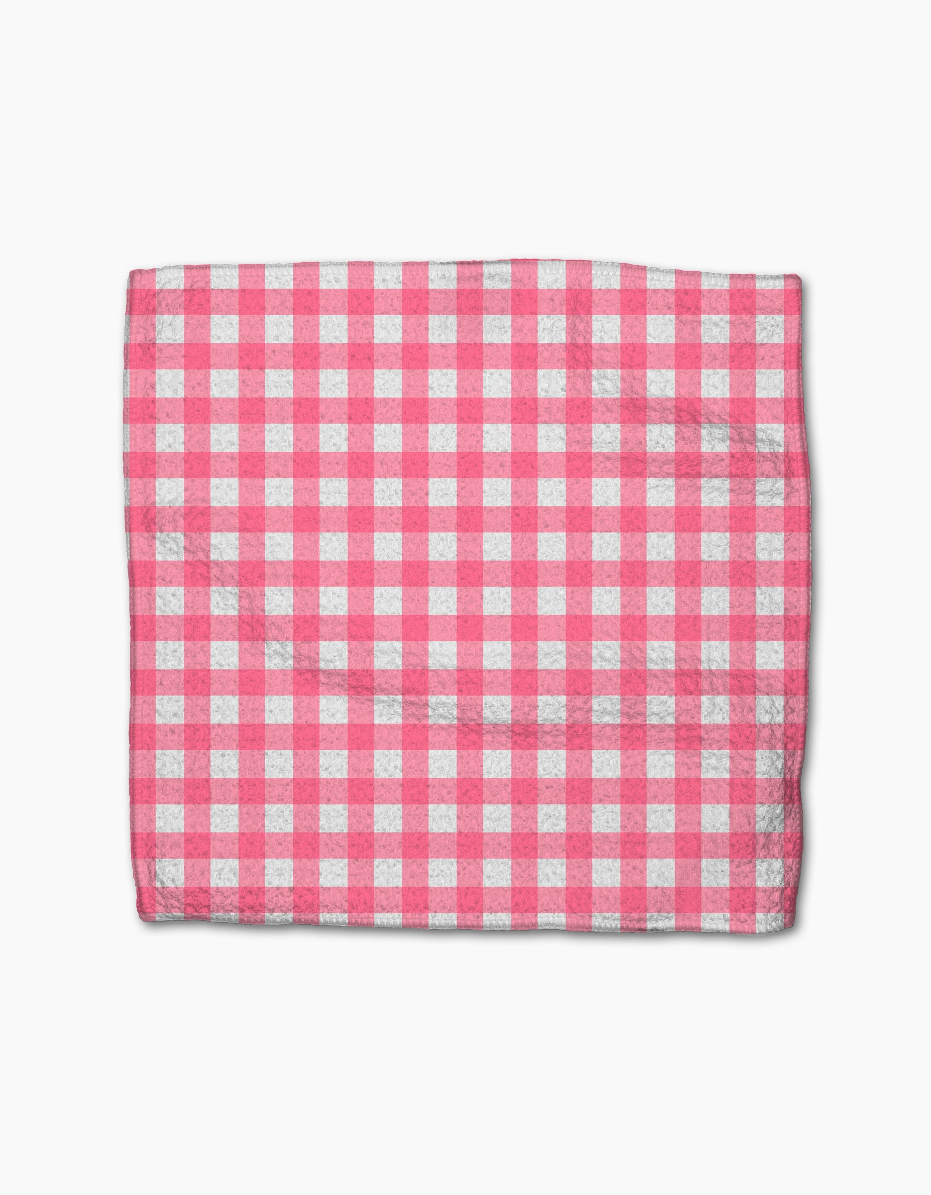 A rectangular Lemon Pop cloth from Ashley Celena’s super-absorbent dishcloth set, displaying a pink and white checkered gingham pattern, is laid flat on a white background.