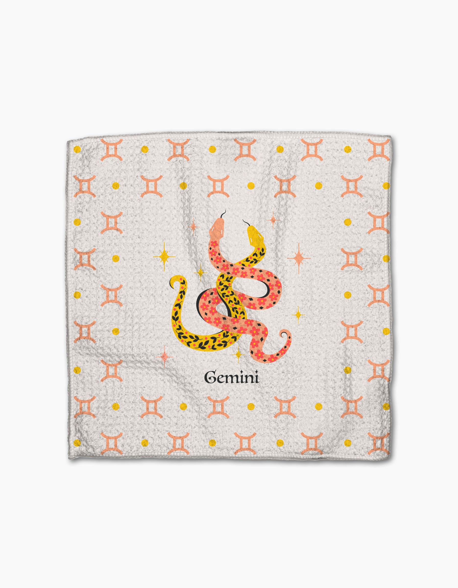 Heather Zhou’s Lucky Gemini recycled white kitchen towel features twin snakes—one yellow with spots, one orange with stars—intertwined above “Gemini” on a background of zodiac symbols and yellow dots.