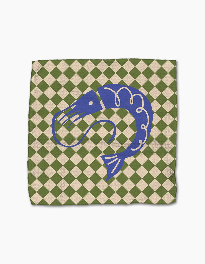 The Mar by Geometry features a blue shrimp illustration centered on a green and beige checkered background, evoking the look of a decorative recycled dishcloth or napkin.