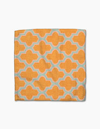 The Mustard Ogee towel by Pascale Dilger is a rectangular textile made from recycled materials with a textured surface and repeating geometric patterns in light blue, shown laid flat on a white background.