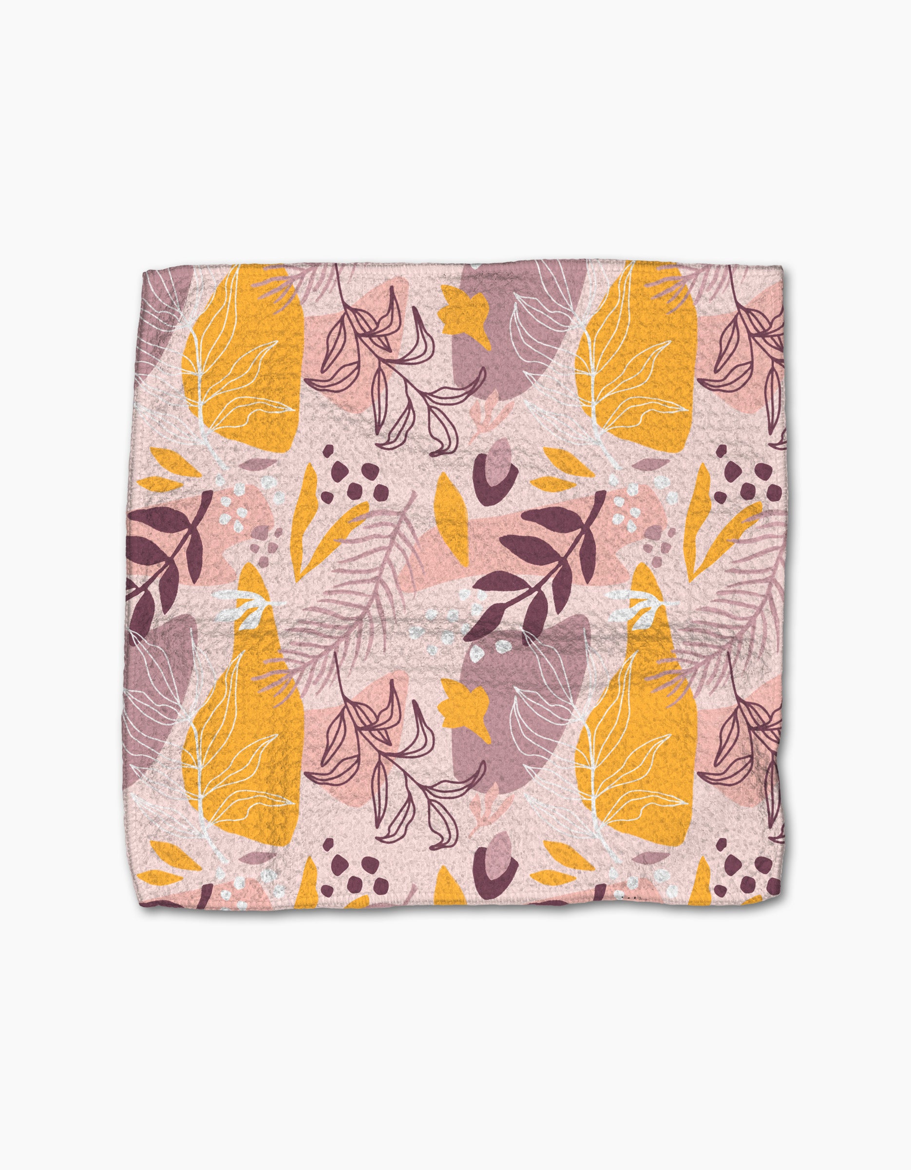 The Nature Sketch dishcloth set by Cottonflower Studio features a soft, rectangular design with a pink background and abstract yellow pears, purple leaves, white and orange branches. Modern, playful look crafted from recycled materials.