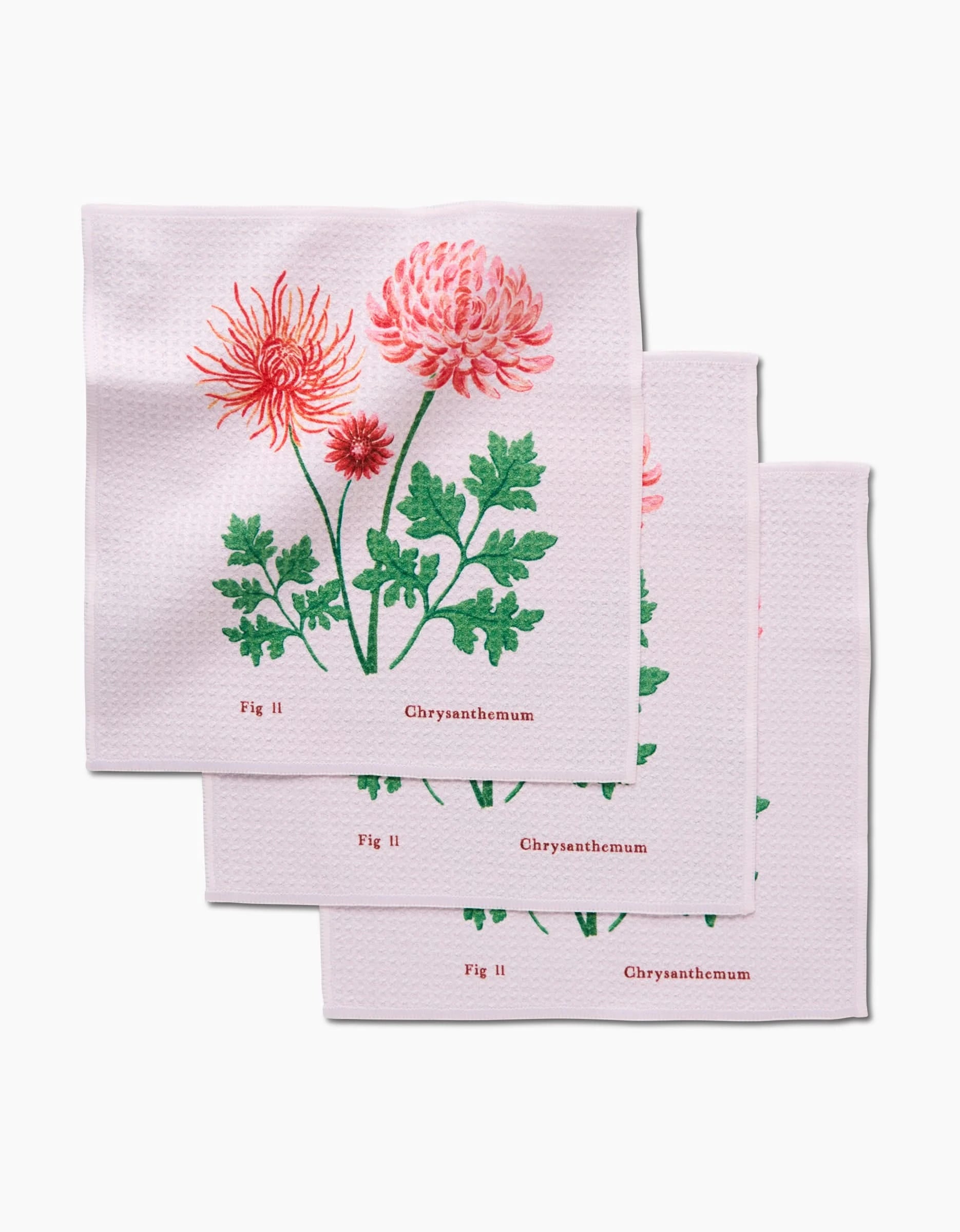 Set of three pink recycled cloth napkins by Linda Fox, each featuring the November Chrysanthemum design: blooming pink chrysanthemums with green leaves and Chrysanthemum and Fig II printed underneath.