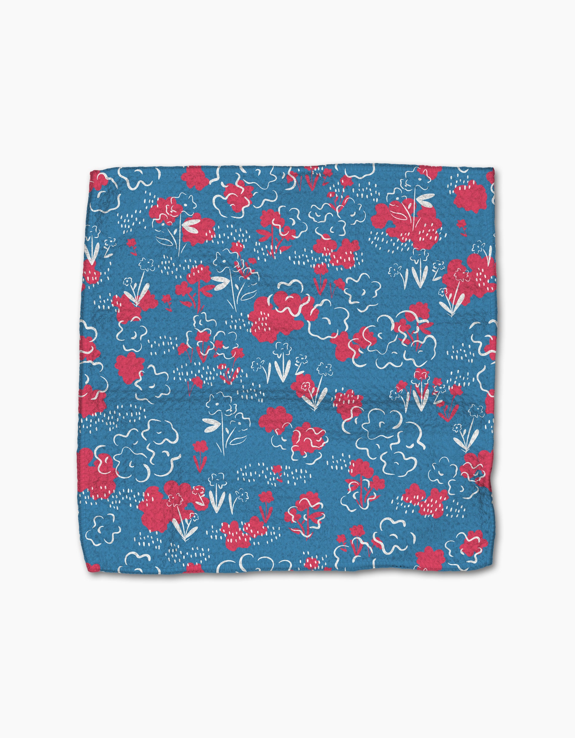 Patriotic Garden by Second Nature Studio is a blue Geoweave fabric square with red and white flowers, leaves, and abstract shapes—an ideal, charming addition to any dishcloth set.
