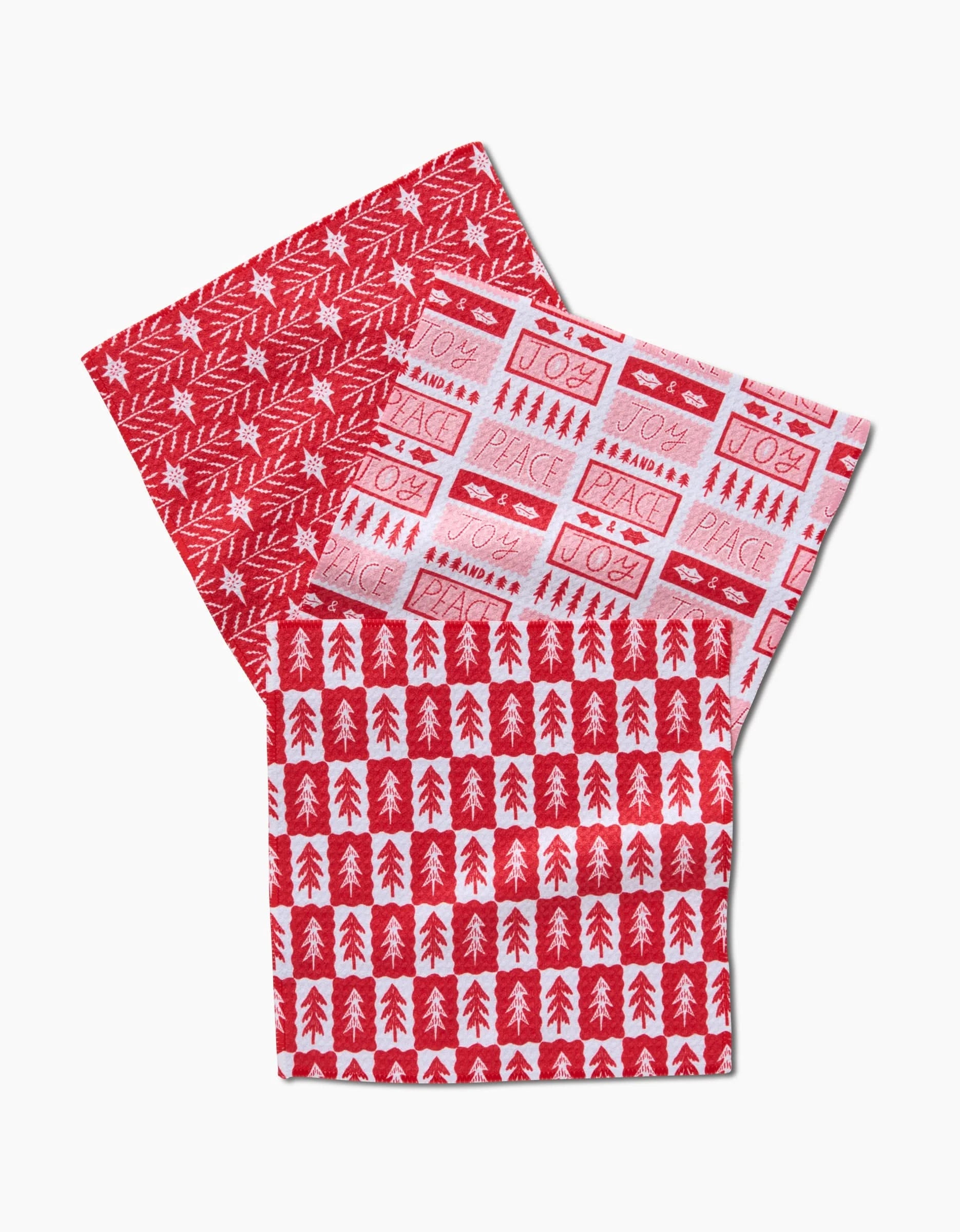 Three red and white dishcloths from the Peace And Love To All set by Roxy Marj, featuring festive patterns, are arranged overlapping on a white background. Made with recycled materials for an eco-friendly touch.