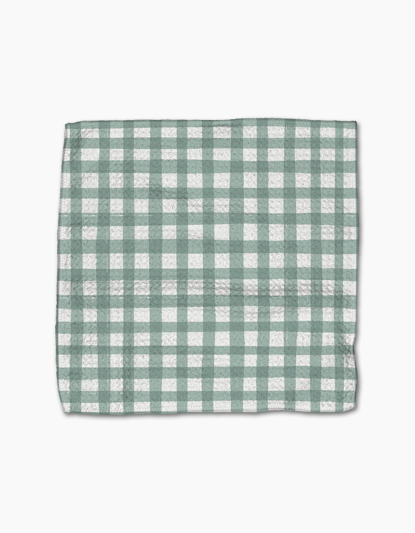 The Picnic Gingham dishcloth by Hufton Studio, featuring a green and white checkered pattern, is laid flat on a white background.