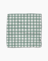 The Picnic Gingham dishcloth by Hufton Studio, featuring a green and white checkered pattern, is laid flat on a white background.