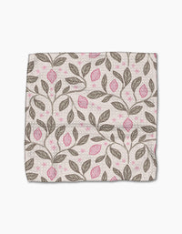 Pink Summer by Teri the Butter is a rectangular cloth made from recycled materials, featuring brown branches with leaves and pink fruits on a light background. The fabric has a slightly wrinkled look and is shown on a white surface.