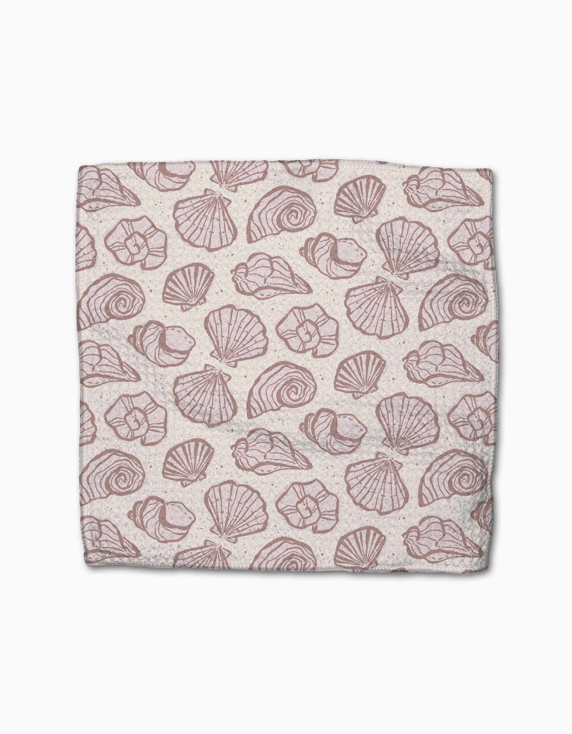 Pink Summer by Teri the Butter is a rectangular cloth made from recycled materials, featuring a repeating pattern of various pink seashell illustrations on a light beige background.