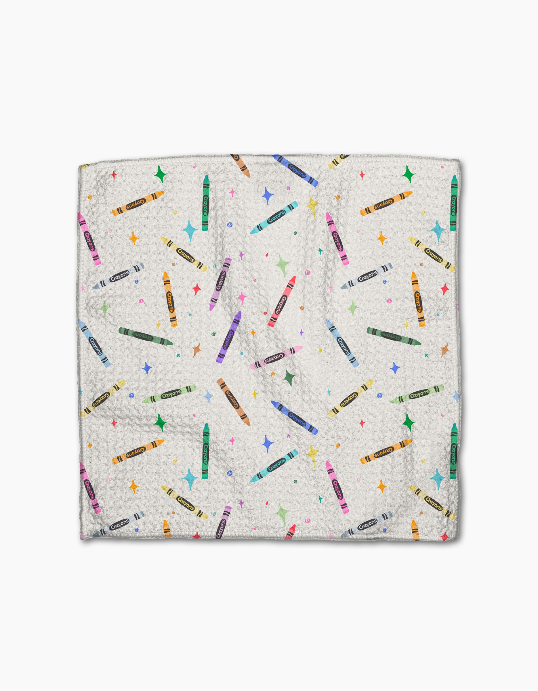 The Scribble Squad by Vaishali Design Studio features a white textured Geoweave fabric adorned with colorful crayons and multicolored stars, shown on a plain white background.