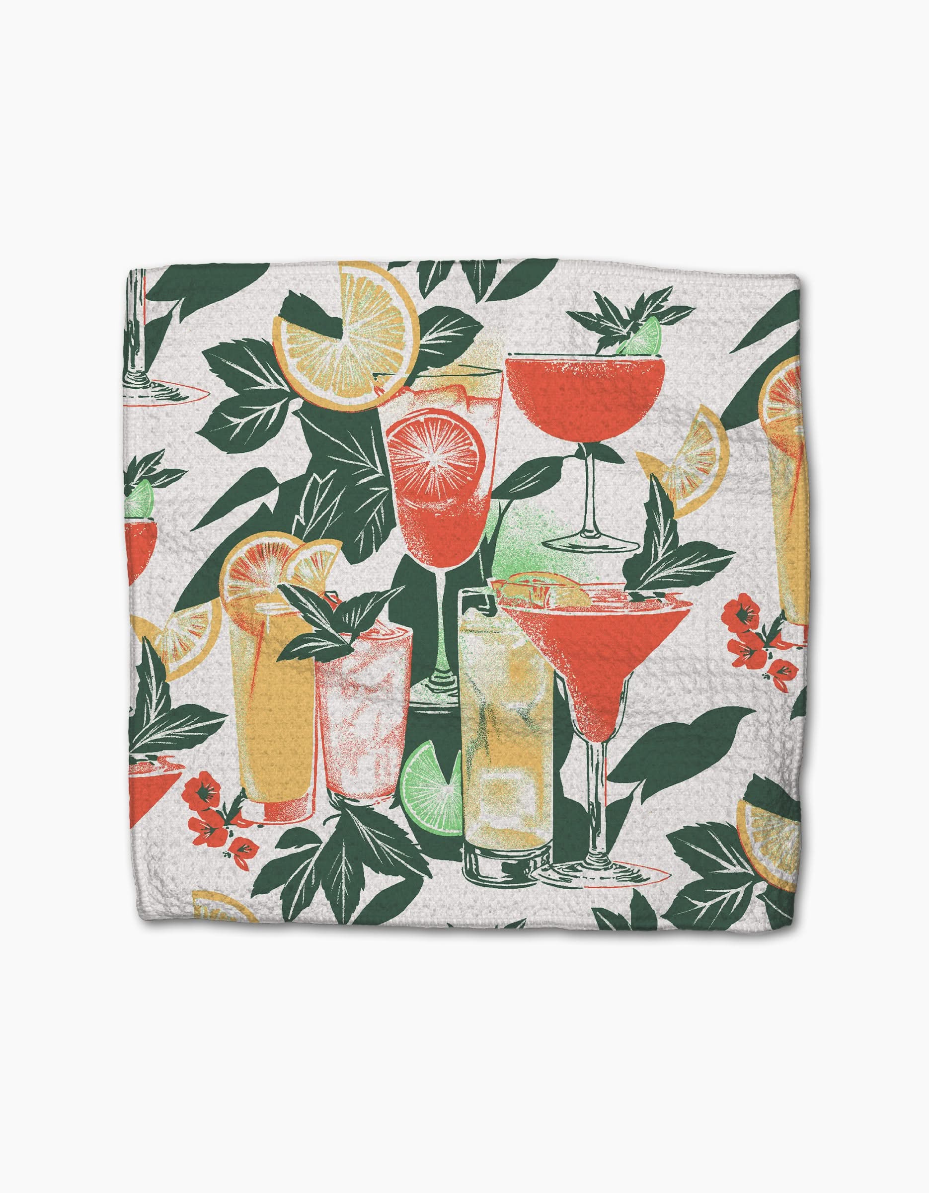The Geometry Summer Refreshments dishcloth displays cocktail glasses with vibrant drinks, lemon slices, orange wedges, green leaves, and red flowers on a white background.