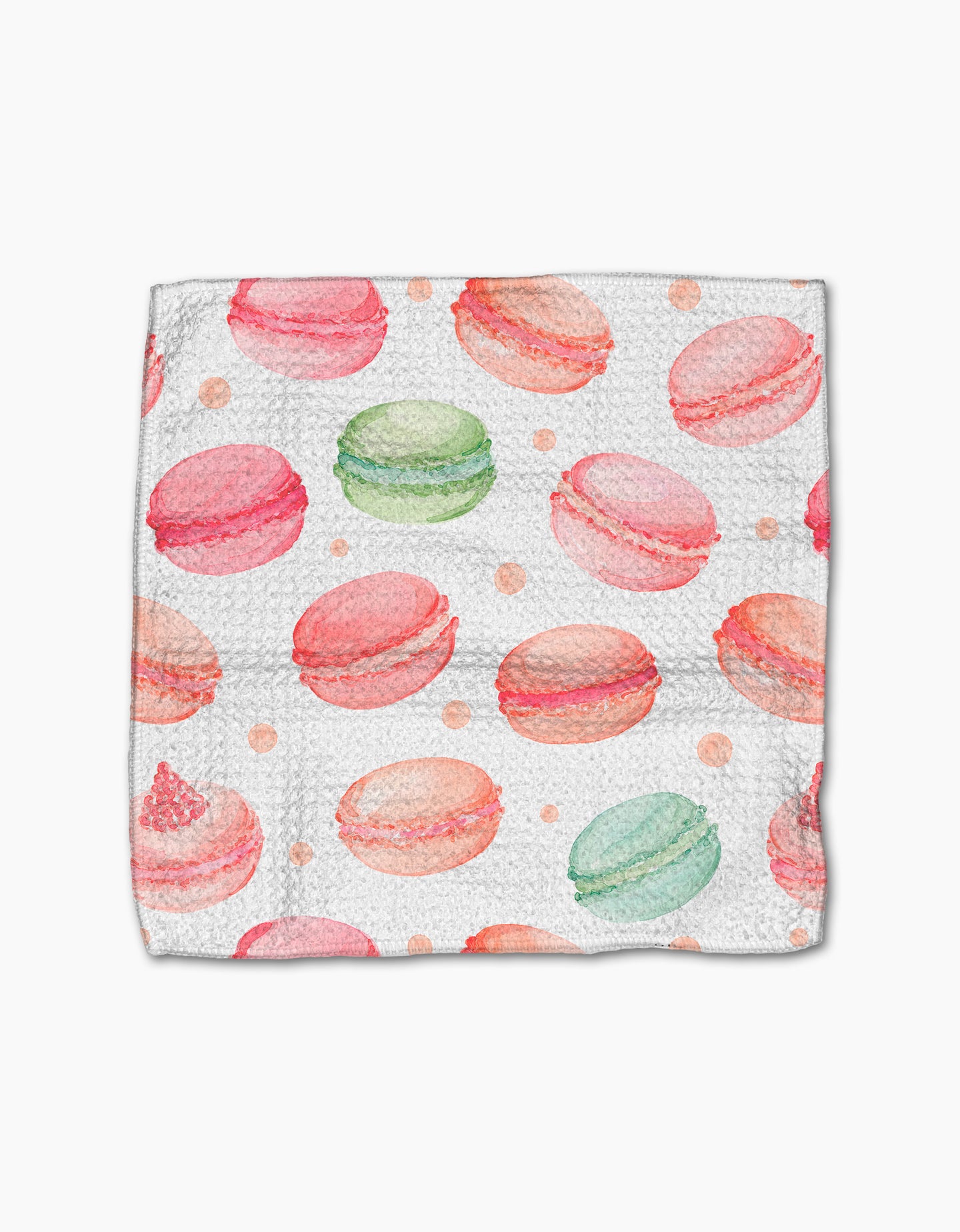 Sweet Macarons by Elena Fay is a white dishcloth made from recycled materials, featuring watercolor-style pink, green, and peach macarons with polka dots.