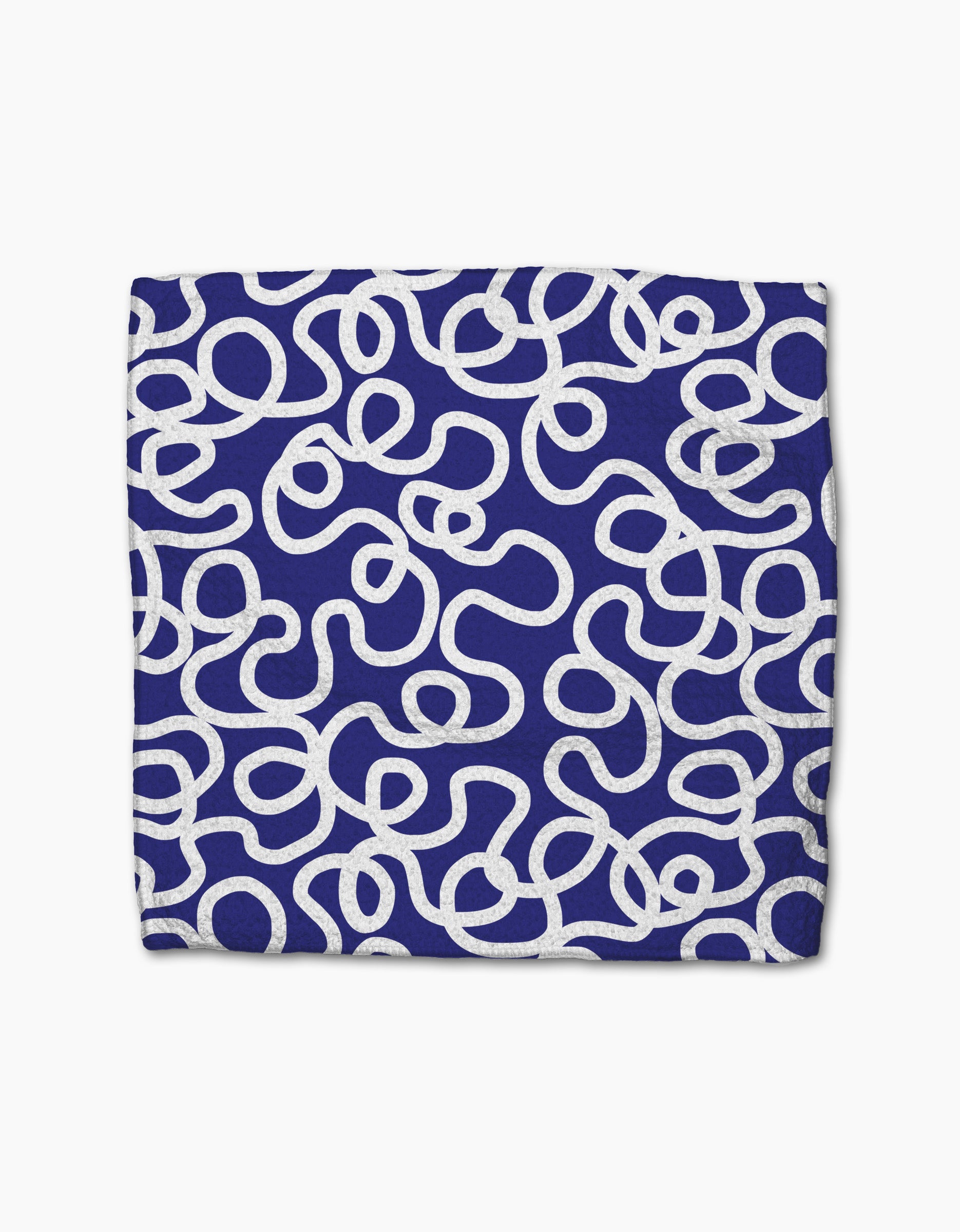 Wander by Rachel Parker is a square, dark blue fabric made from recycled materials, with interlocking white squiggly lines looping and curving randomly across the surface.