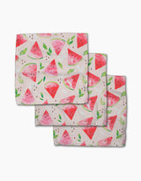 Three stacked Elena Fay Watermelon Slice dishcloths feature colorful watermelon slices, seeds, and green leaves on a light background, made from durable Geoweave fabric.