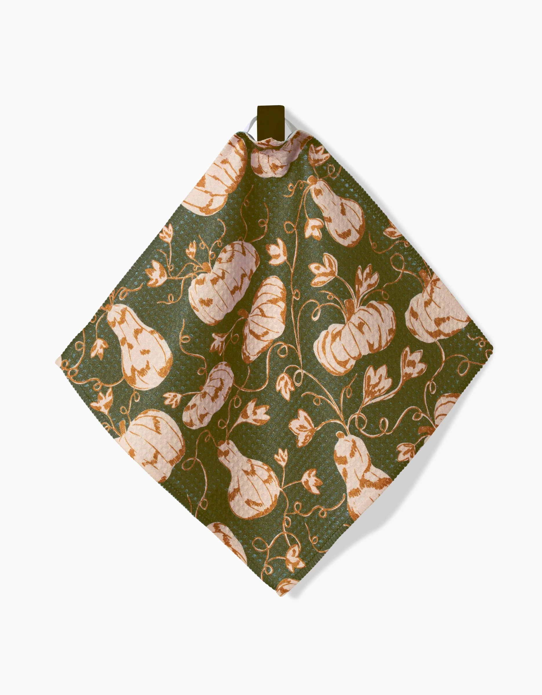 The Kayla Ann Woodland Trail cloth features a square Geoweave fabric with an orange pumpkin and vine pattern on a dark green background—an eye-catching, stylish addition to your dishcloth set.