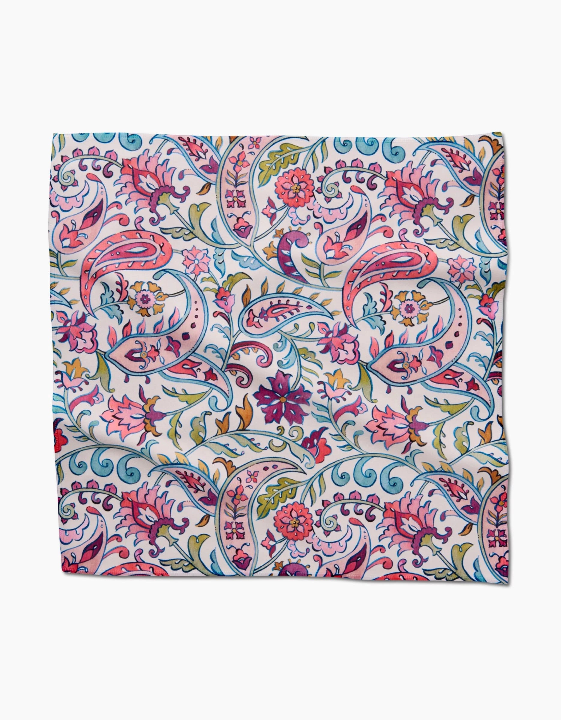 Bazaar by Maayan Alper-Swan is a square scarf featuring vibrant paisley and floral patterns in pink, purple, blue, and green on white. Made from soft, eco-friendly Geosuede fabric, it offers a slightly wrinkled texture.