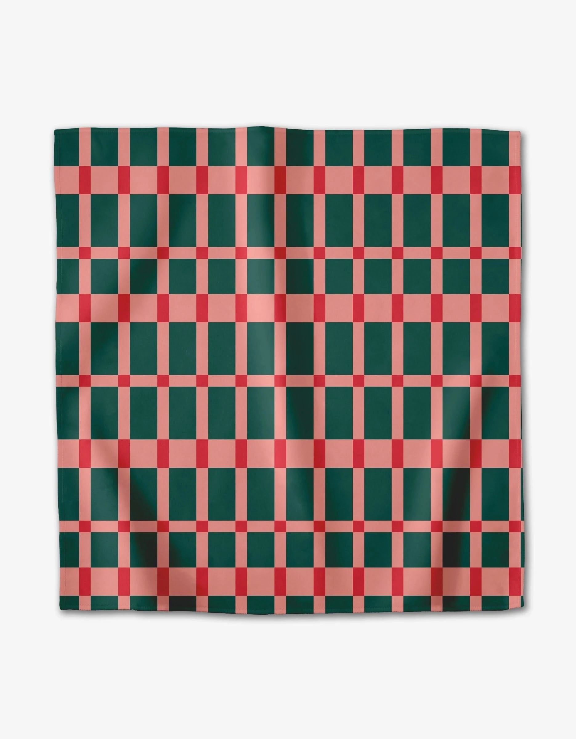 The Candy Plaid by Rebecca Woolbright is a rectangular recycled dinner napkin with a checkered dark green and red pattern intersected by pinkish-red stripes, shown flat with gentle folds.