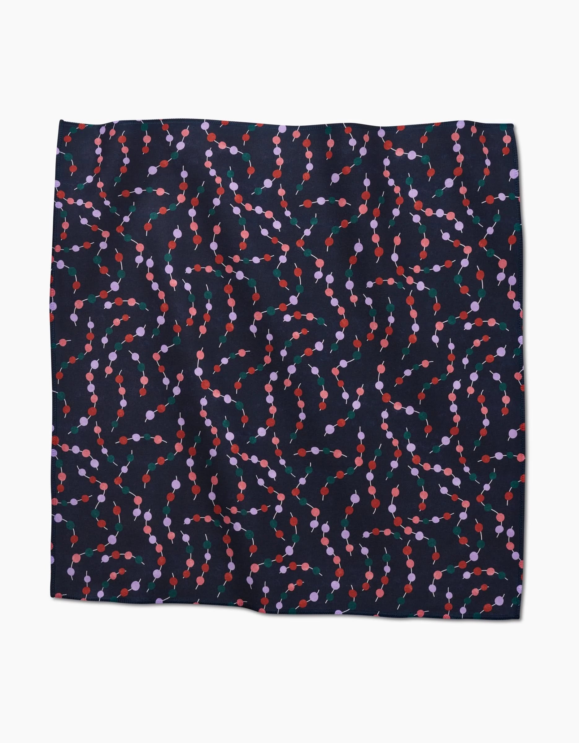 Holiday Garland by Claire Iglesias: a dark Geosuede fabric square featuring small, interconnected red, pink, and purple dots linked by green lines and scattered diagonally across the surface.
