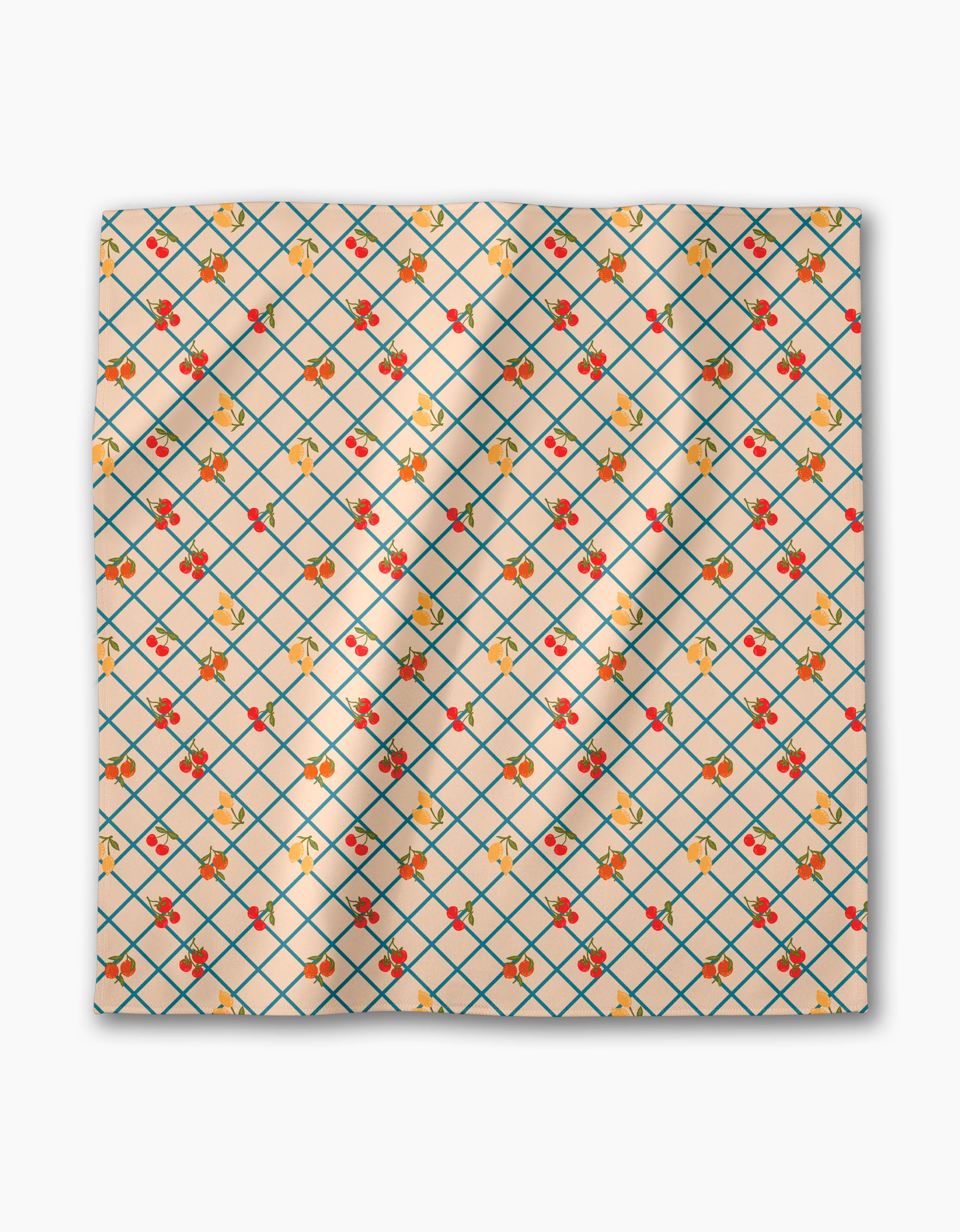 The Italian Summer Grid by Geometry is a square Geosuede fabric in light beige, featuring a blue diamond grid pattern with scattered red cherries and yellow flowers.