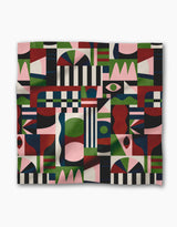 The Modern Bauhaus Mood blanket by Claire Iglesias features a colorful, abstract design with geometric shapes—stripes, circles, and rectangles—in red, green, navy, black, and pink. Made from recycled materials for a modern artistic look.