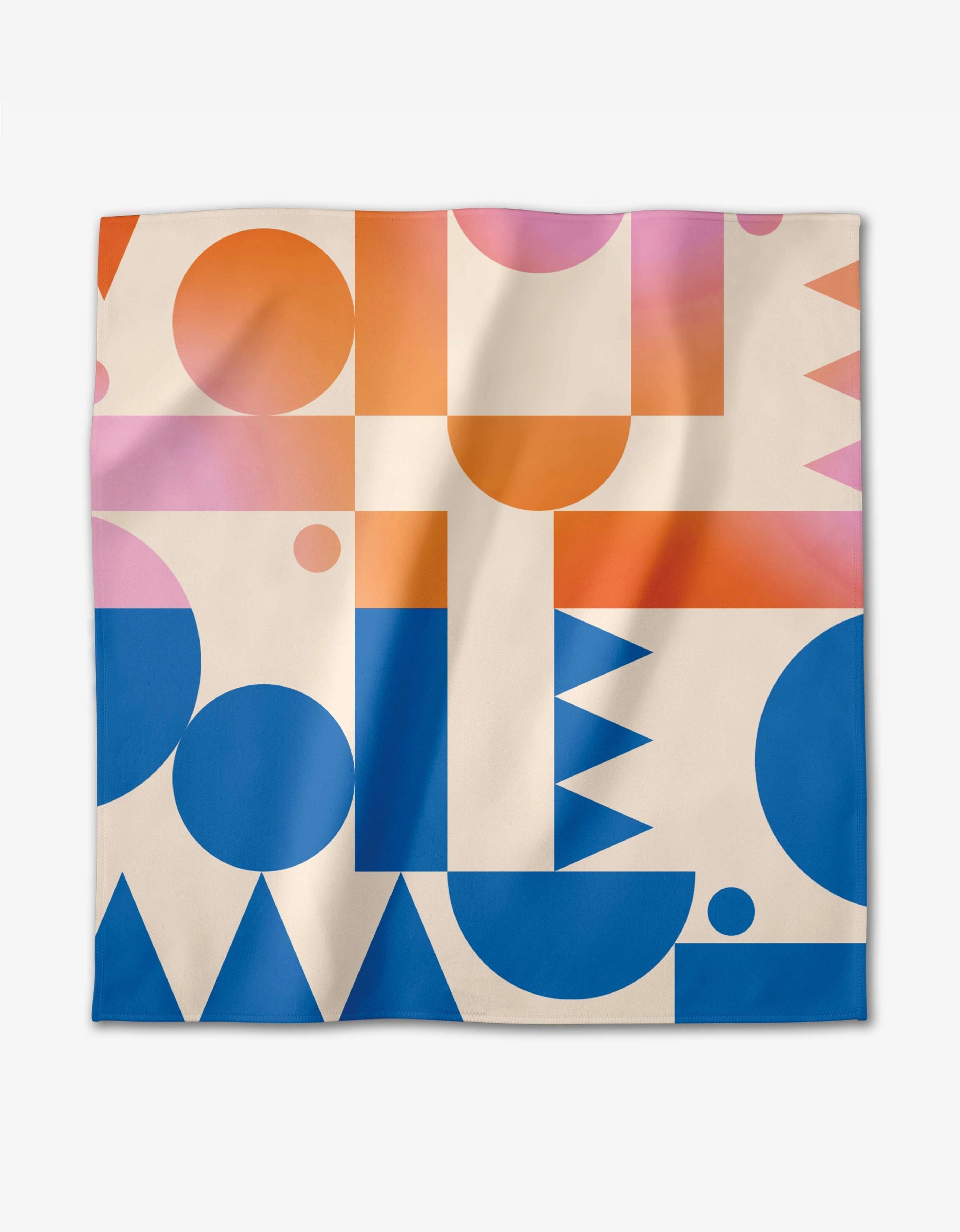 The Moody Shapes dinner napkin set by GEOMETRY is crafted from Geosuede fabric and showcases orange, pink, and blue geometric shapes on a light beige background.
