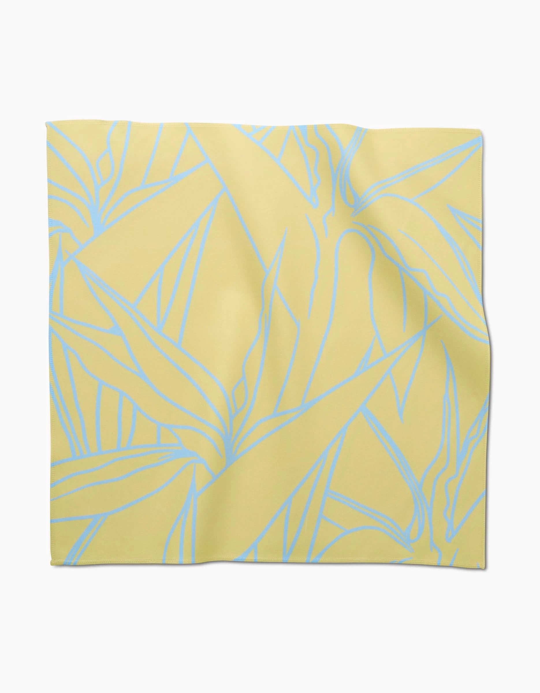 The Paradise Blooms cloth by GEOMETRY is a square yellow Geosuede fabric featuring a subtle blue leaf outline pattern, slightly wrinkled and displayed flat on a white background.