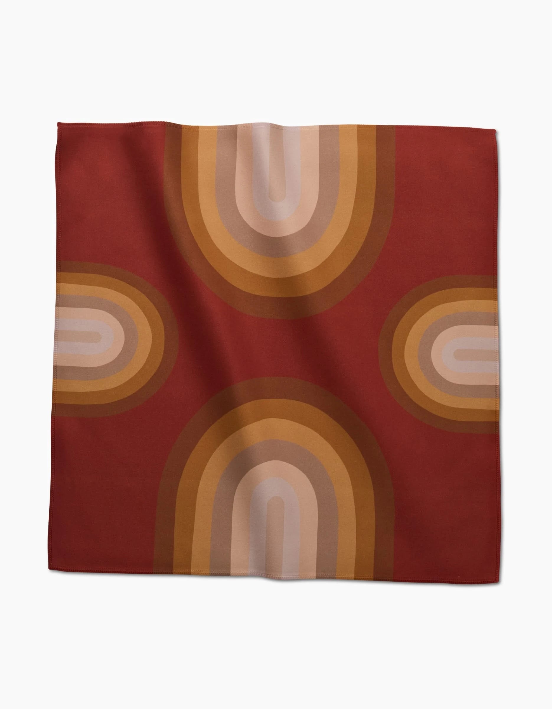 The Pumpkin Spice square scarf by GEOMETRY features a retro arch design in brown, tan, and beige on a deep rust red background, with arches near each corner and center edge—evoking classic dinner napkin set style for a chic accent.