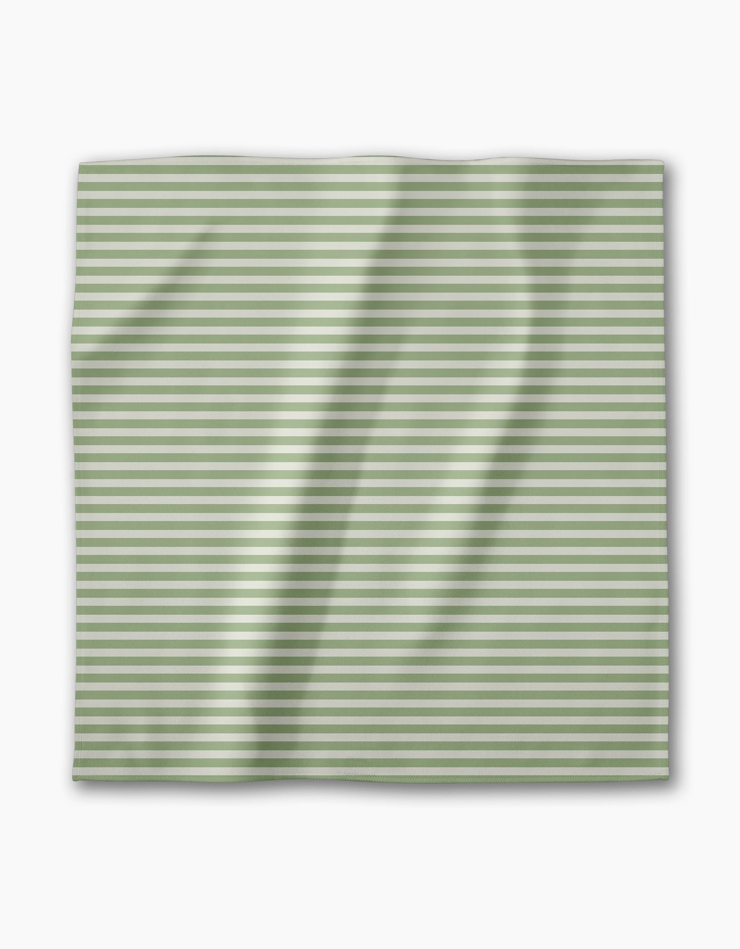 A square piece of Geometrys Seagrass Geosuede fabric with horizontal light green and white stripes, slightly wrinkled, shown on a white background.