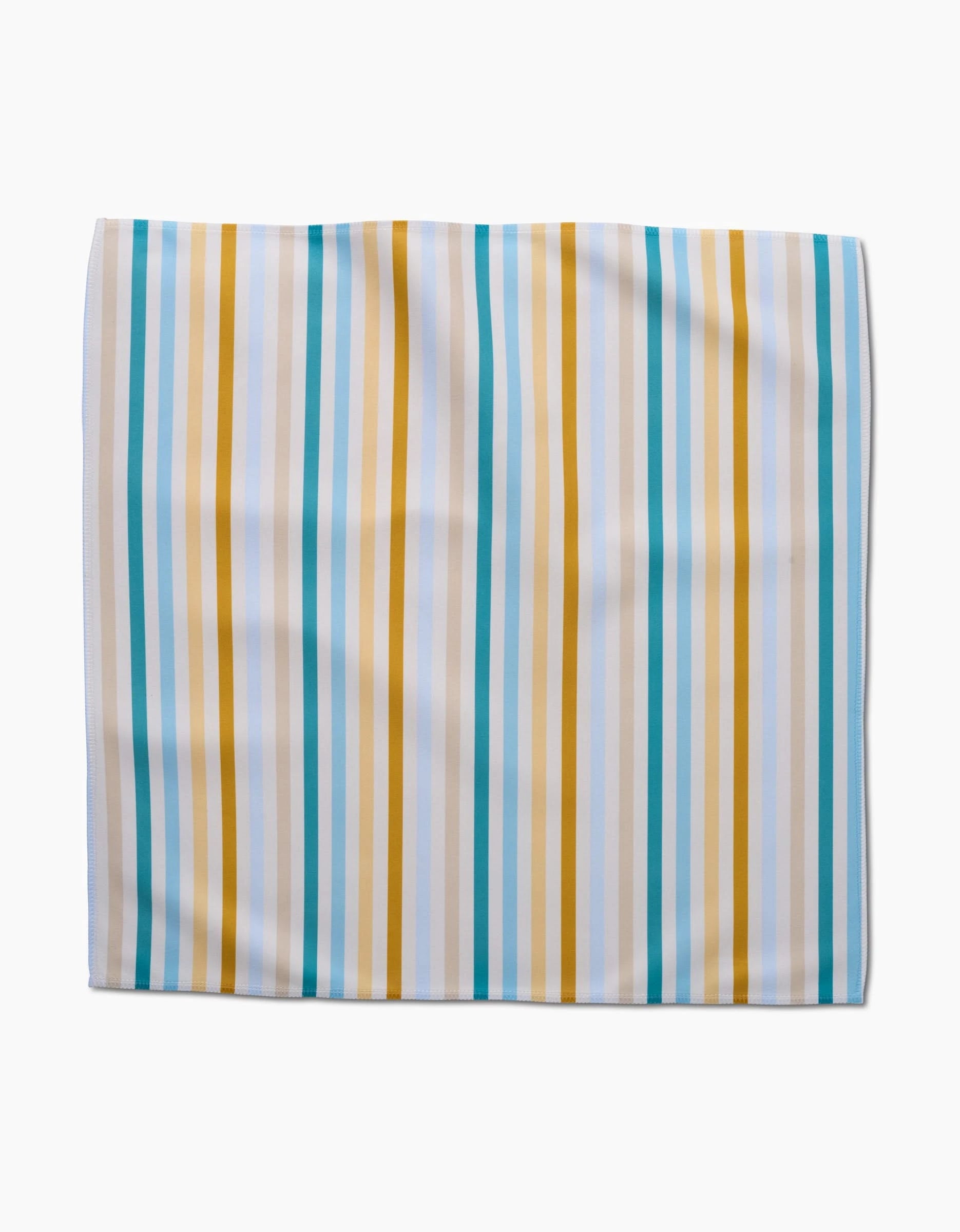 The GEOMETRY Seaside Sunshine Dinner Napkin features vertical teal, mustard yellow, and white stripes on a light background, crafted from Geosuede fabric and shown flat on a white surface.