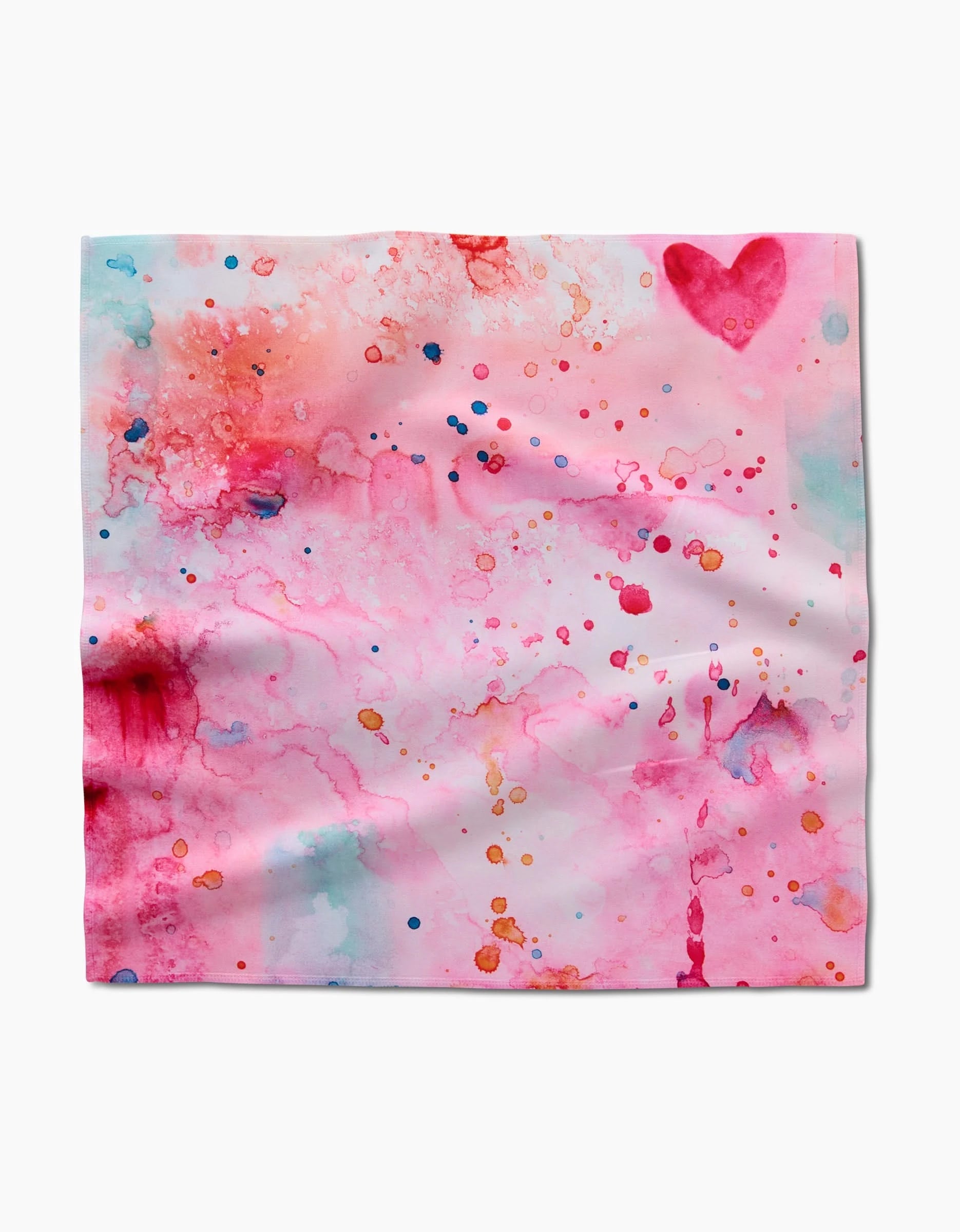 Sara Maris Splash of Love is a pink, absorbent dinner napkin with red, blue, orange, and purple watercolor splashes and a bold pink heart in the upper right corner.