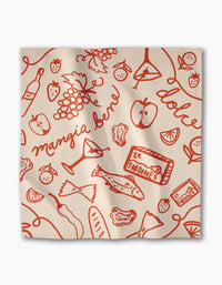 The Geometry Summer Air Dinner Napkin Set features beige napkins with red Italian food illustrations and cursive phrases mangia bene and dolce, crafted from recycled materials for an eco-friendly touch.