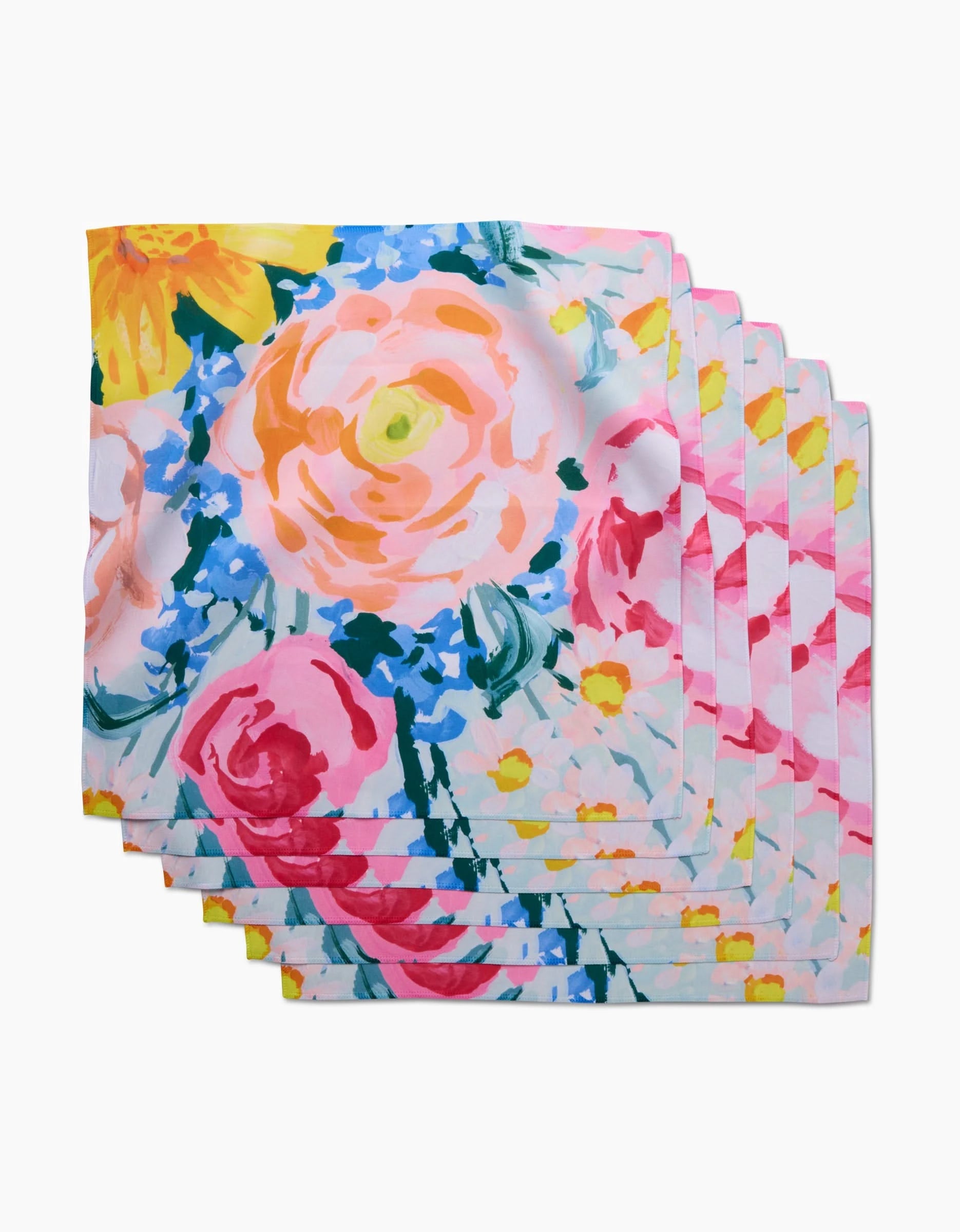 Six Suzzy cloth napkins by Ania Zwara Art, made from sustainable Geosuede fabric with a vibrant pink, yellow, and blue floral pattern on white—an eco-friendly and beautiful dinner napkin set.