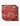 Geometry’s “Western Scene” napkin is a red, recycled dinner napkin featuring a white line drawing of mesas, horses, and desert plants. The eco-friendly napkins are stacked neatly with the design prominently displayed.