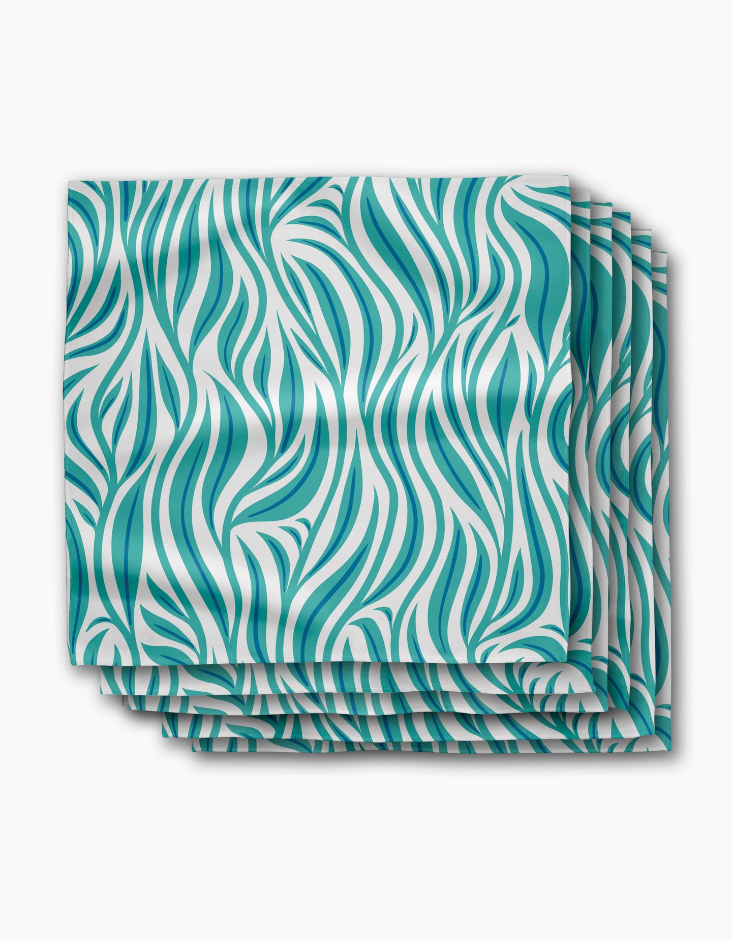 Four stacked Willow Wave dinner napkins by Rachel Parker, crafted from recycled Geosuede fabric with a wavy teal and white abstract pattern, set on a plain white background for an eco-friendly touch.