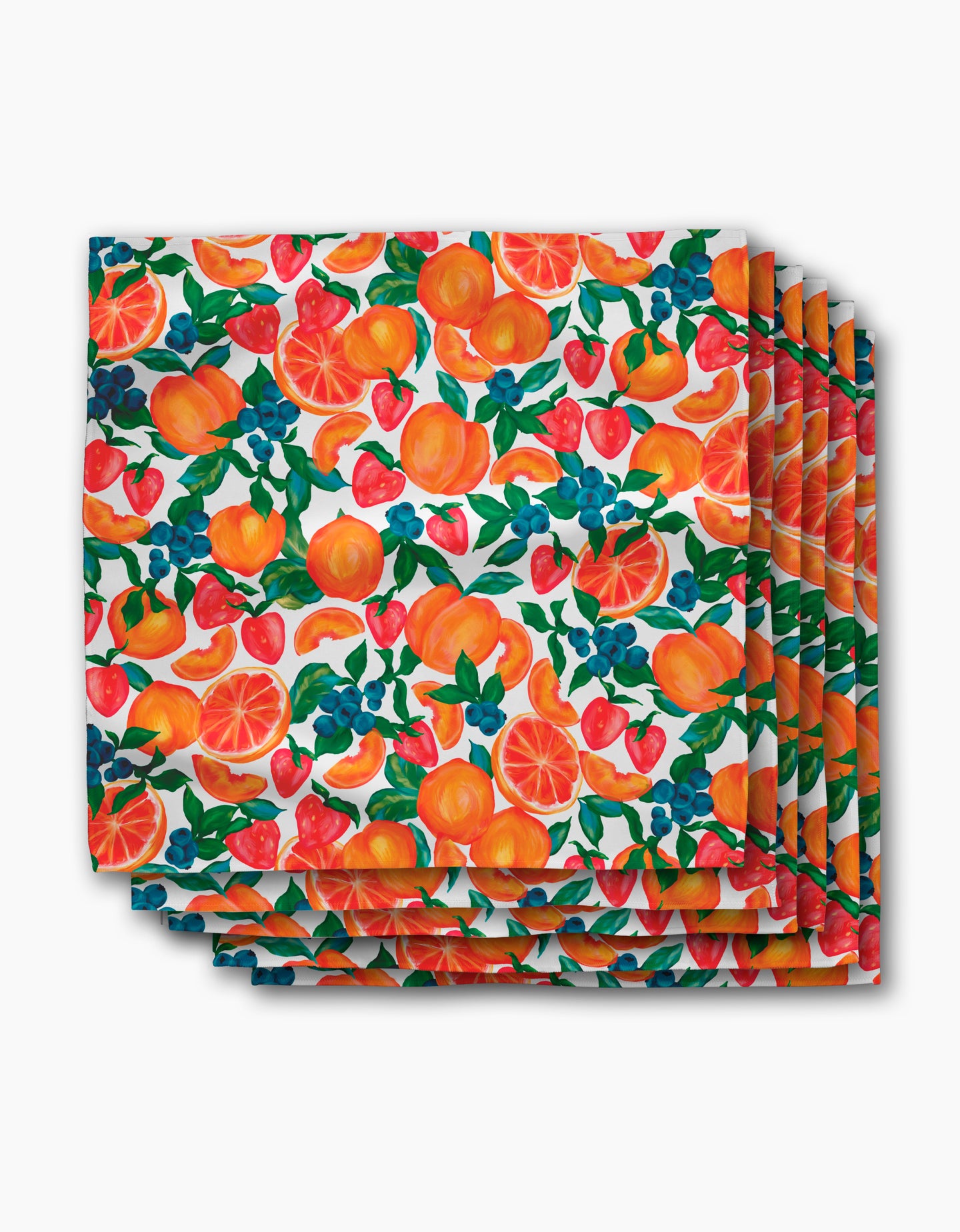 The Aubrey Fairchild Zesty Life Dinner Napkin Set features a vibrant fruit pattern with oranges, strawberries, blueberries, and grapefruit on white, crafted from post-consumer recycled materials.