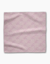 The Geometry Bubble Ditzy Dusty Rose is a soft pink reusable fabric napkin featuring a subtle pattern of small, scattered dark pink lines and dots, shown flat against a white background.