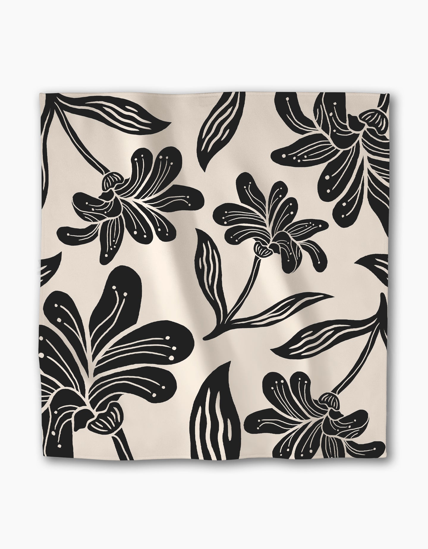 The Geometry Giant Lush Floral dinner napkin set features a bold black and white floral pattern with large, stylized flowers—a stylish, reusable square cloth napkin perfect for dining.