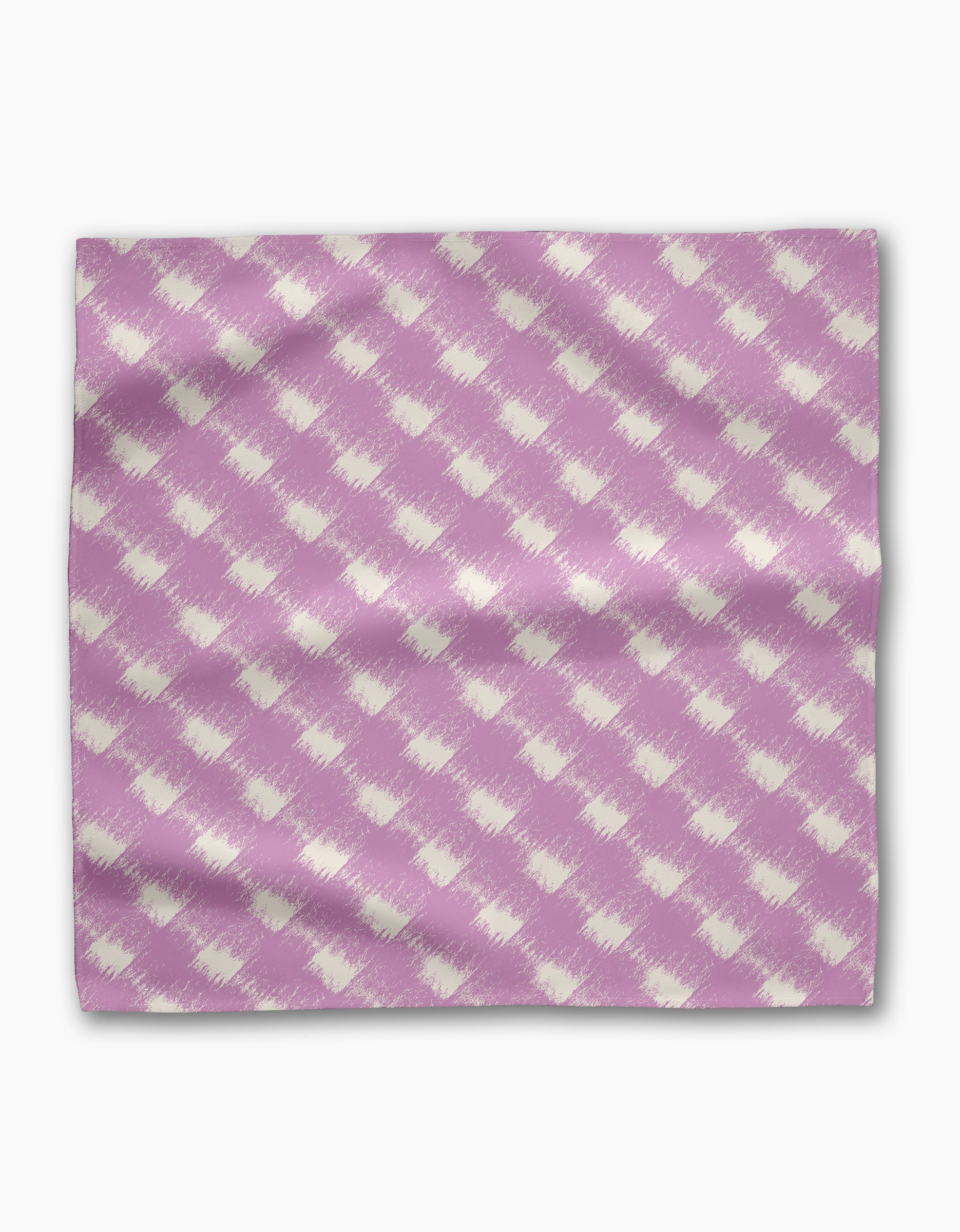 Hairy Check Pink by Geometry is a rectangular Geosuede fabric with a light purple and off-white diagonal checkered pattern, subtle texture, slight folds, and made from recycled materials—all shown on a white background.
