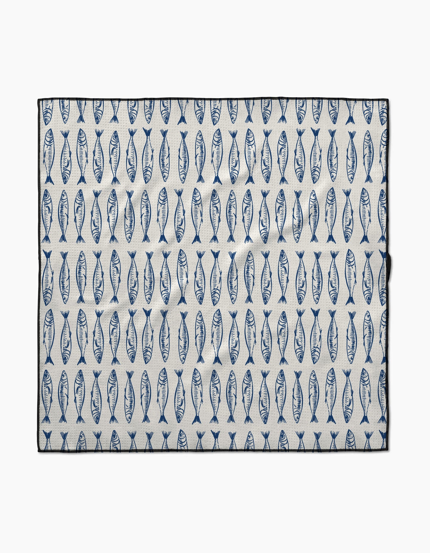 The Sardine Stripes mat by Hufton Studio is a rectangular white mat made from recycled materials, featuring rows of evenly spaced vertical blue fish and a black border.