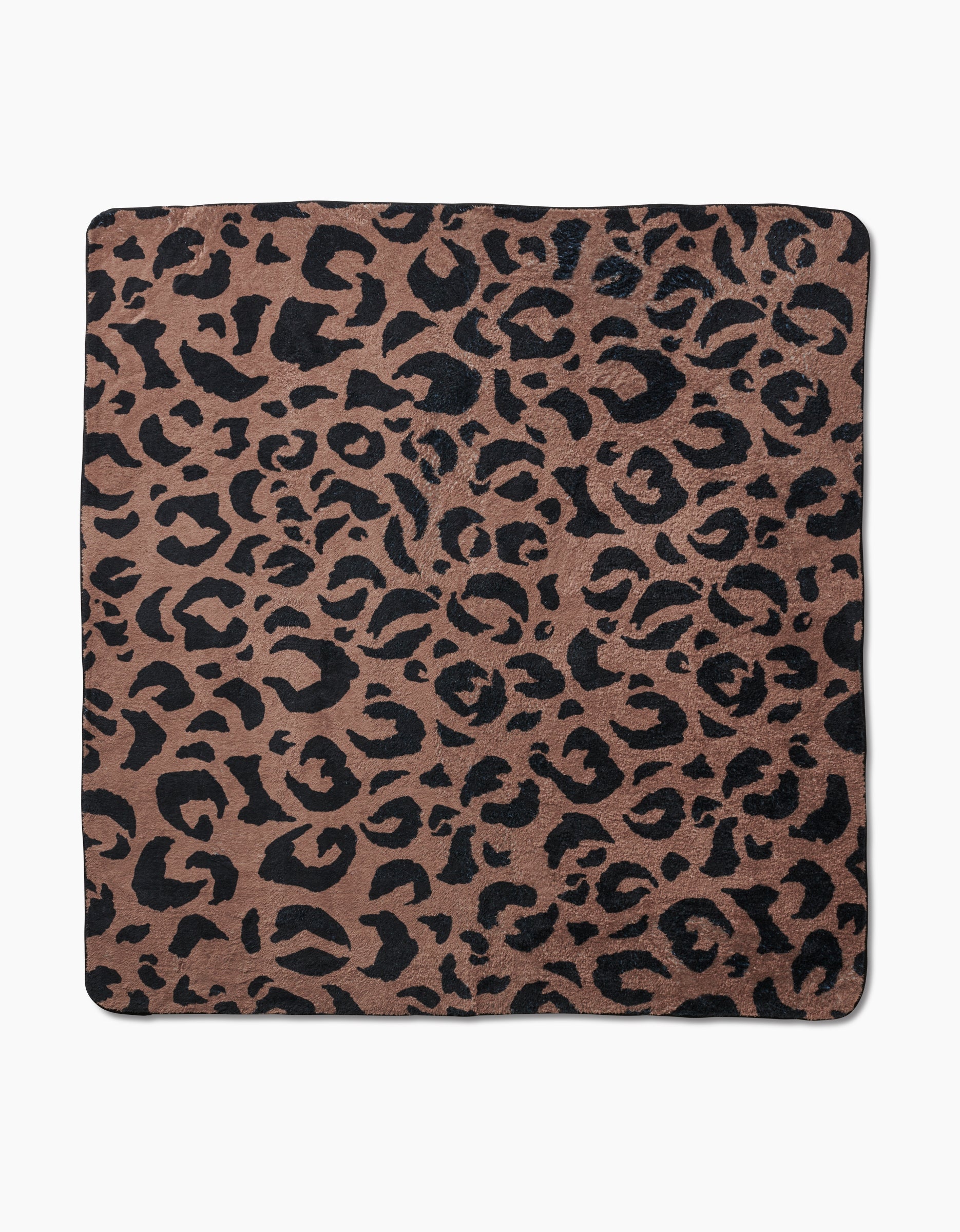 The Geometry Cheetah Hound is a square plush dog towel featuring a black cheetah print on a brown background, made from recycled materials and shown laid flat on a white surface.