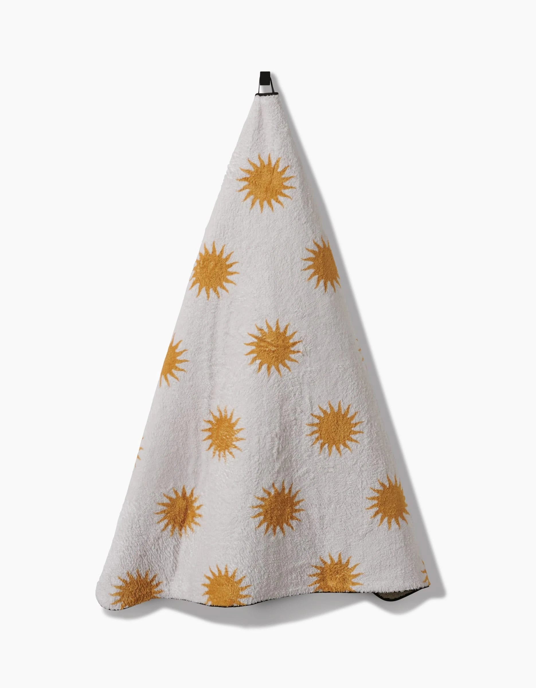 The Geometry Feeling Sunny towel is an ultra-absorbent white hanging towel featuring evenly spaced yellow sun shapes, displayed against a plain white background.